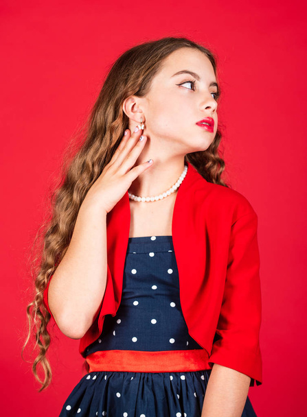 Hairdresser salon. Retro fashion. Movement towards vintage fashion. Little girl makeup face curly hairstyle vintage outfit. Fast fashion essentially business model companies that manufacture products - 写真・画像
