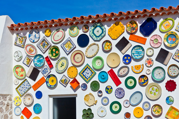 Traditional portuguese pottery plates on a wall - Photo, Image