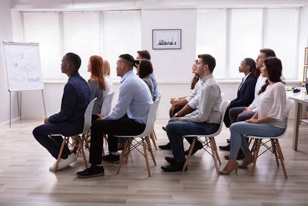 Diverse Group Of Successful Business People Sitting On Chair In The Conference Room - Foto, Imagen
