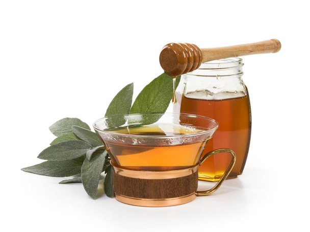 Herbal tea with salvia and honey on white background - Photo, Image