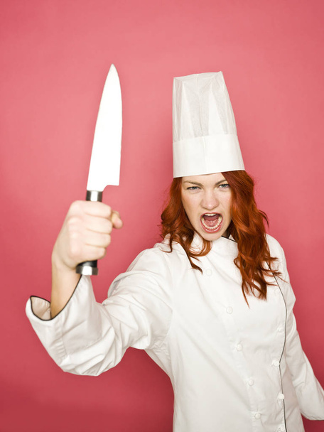 Female Chef on pink background - Photo, image