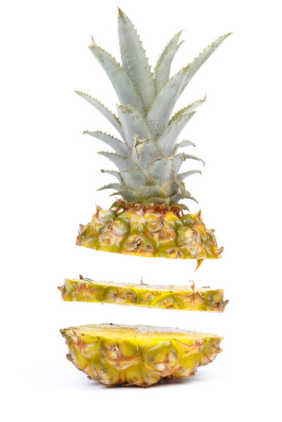 Fresh sliced pineapple on a white background. Close up. - Foto, afbeelding