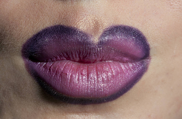 close up of beautiful female lips with red lipstick - Foto, Imagen