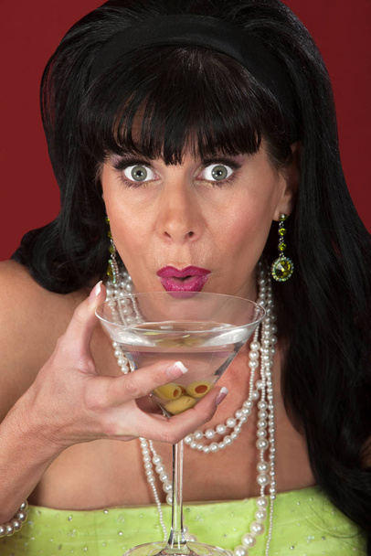 Excited Retro-styled woman with martini glass - Fotoğraf, Görsel