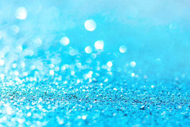 Keskittynyt sininen glitter tausta. sininen abstrakti bokeh backgroun
 - Valokuva, kuva