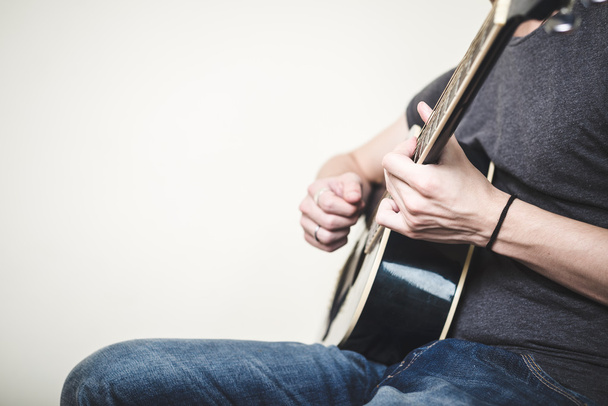 close up of hands playing guitar - Photo, Image