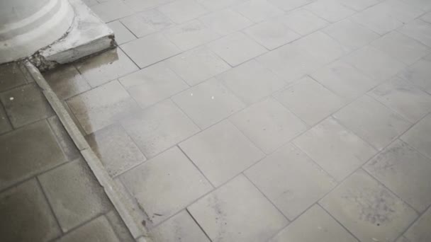 Large raindrops fall on the tile. - Footage, Video