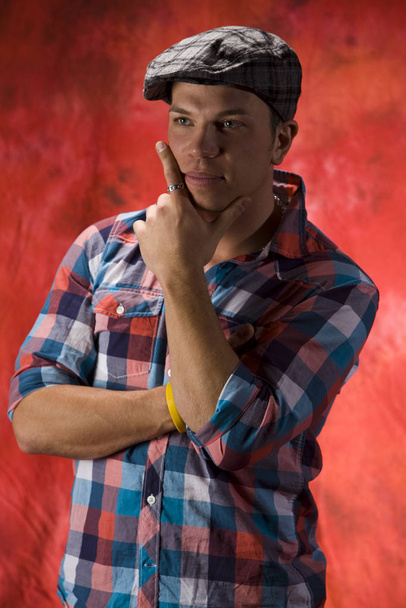 portrait of a handsome man in a plaid shirt - Photo, Image