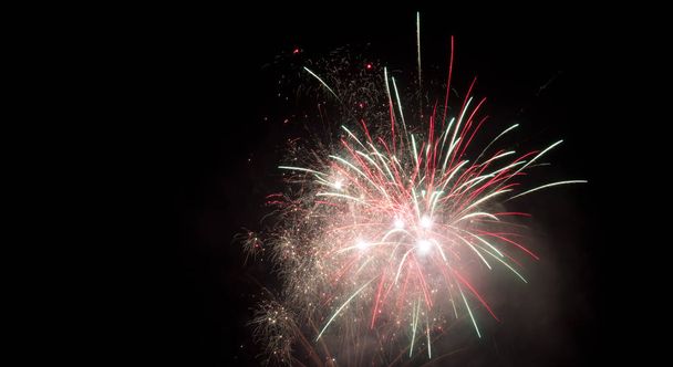 fireworks explosion at night sky, celebration - Photo, Image