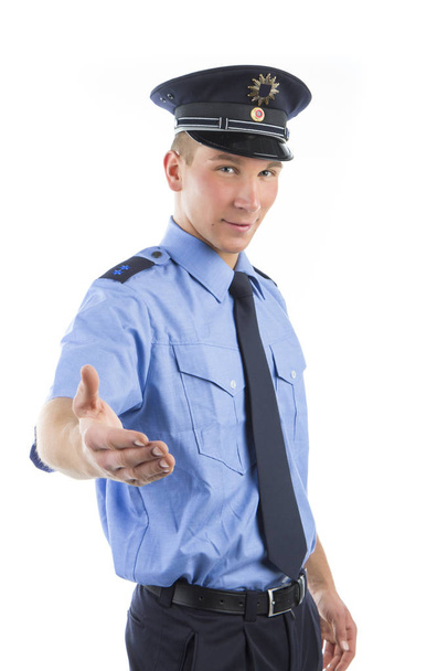 young asian man in police uniform with arms crossed isolated on white background - Fotoğraf, Görsel