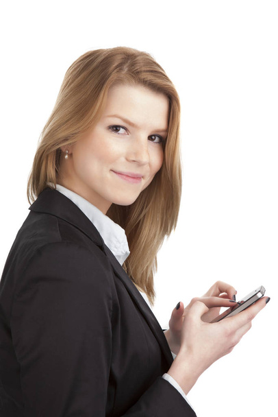  young blonde woman business look with smartphone - Foto, imagen