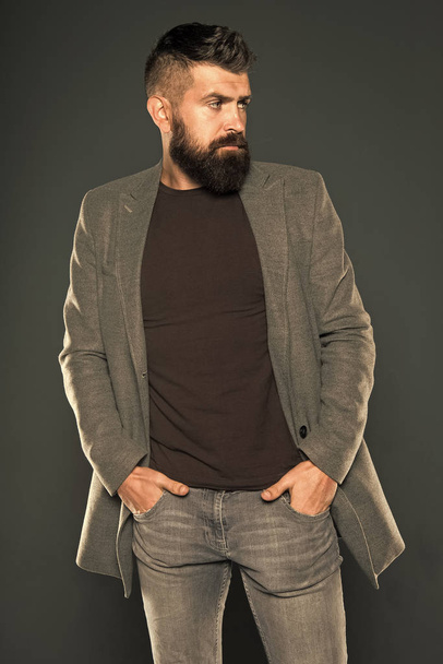 Warm jacket. Fall fashion. Maintaining masculine look. Brutal hipster man. Hipster wearing casual clothes. Hipster with beard hair and stylish haircut. Bearded man trendy hipster style. Daily outfit - Foto, Imagem