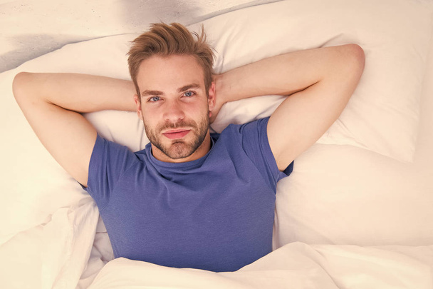 Bearded man face relaxing. Relaxing before fall asleep. Get enough amount of sleep every night. Maintaining consistent circadian rhythm essential for general health. Man handsome guy relaxing in bed - Foto, afbeelding