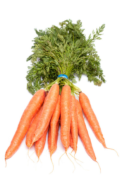 a bunch of carrots on white background - Photo, image