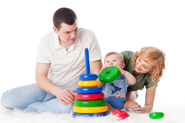 Happy family with sweet baby play  on a white background. - Foto, Imagem