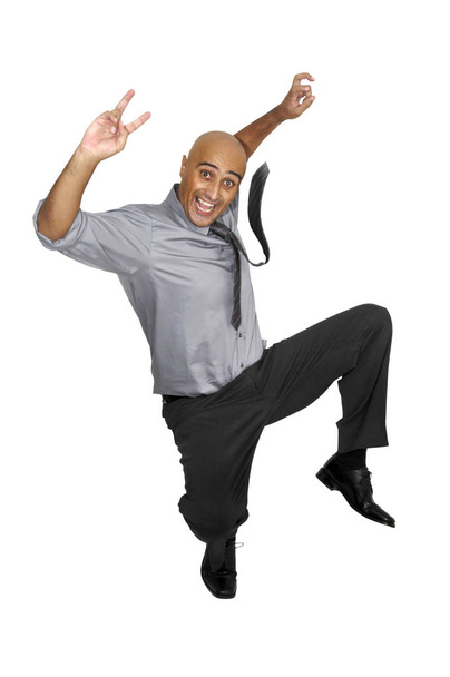 Happy businessman jumping high  isolated in white - Фото, зображення