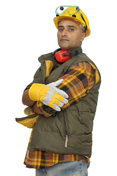 Worker with hat and hearphones isolated in white - Foto, immagini