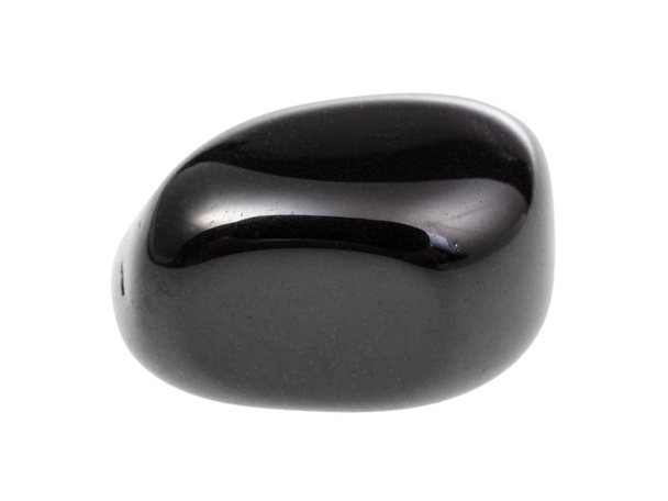 tumbled black onyx gemstone isolated on white - Fotó, kép