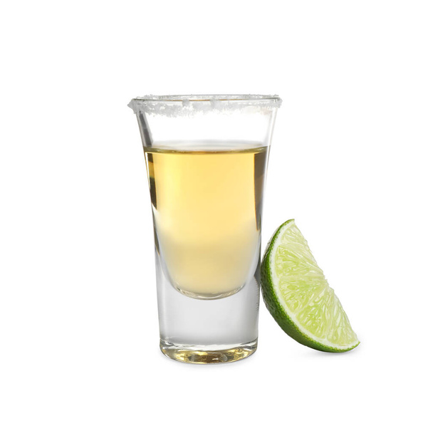 Mexican Tequila shot with salt and lime slice isolated on white - Фото, изображение