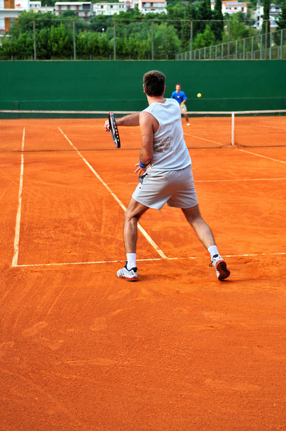 One Man play tennis on outdoor court - Foto, Imagem
