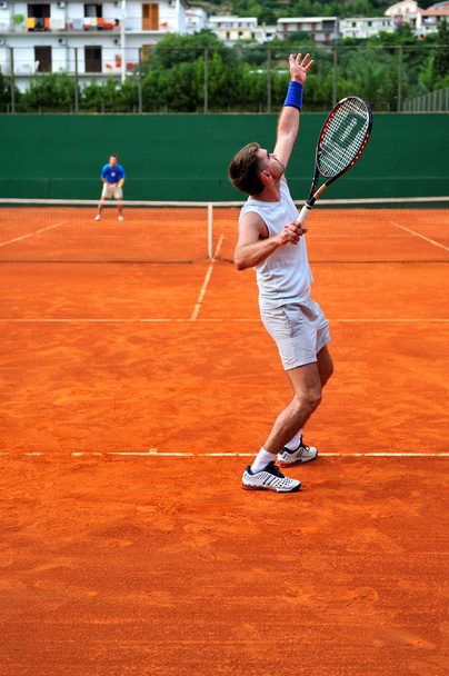 One Man play tennis on outdoor court - Фото, зображення