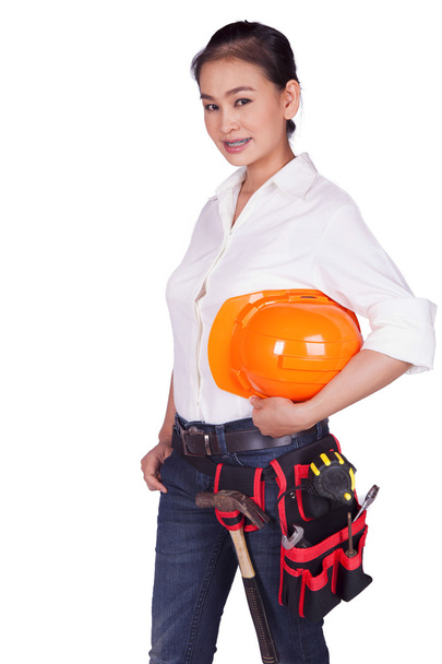 Ingeniera femenina con casco naranja
 - Foto, Imagen