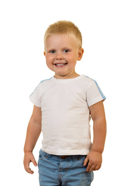 Adorable smiling toddler standing, isolated on white - Valokuva, kuva