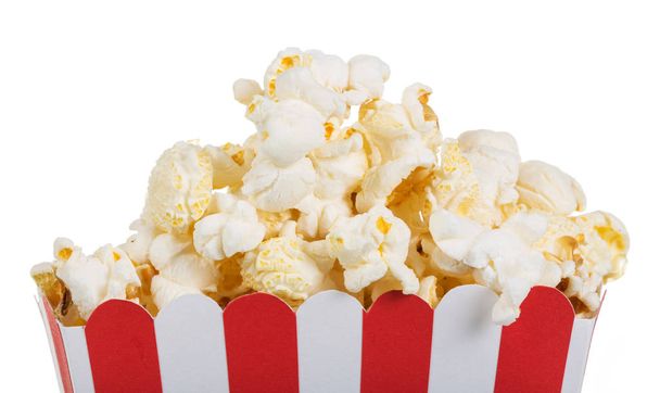 Popcorn in big box close up isolated on white. - Photo, image