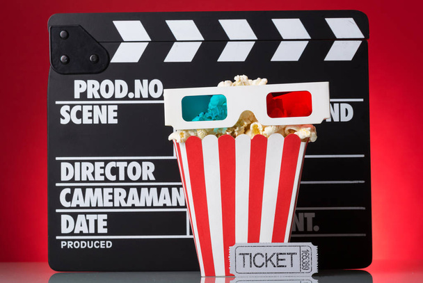 Paper square box popcorn, 3D-glasses, movie tickets  - Photo, Image