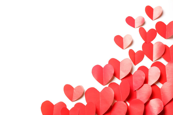 Cut out of red paper hearts on white background isolated. - 写真・画像
