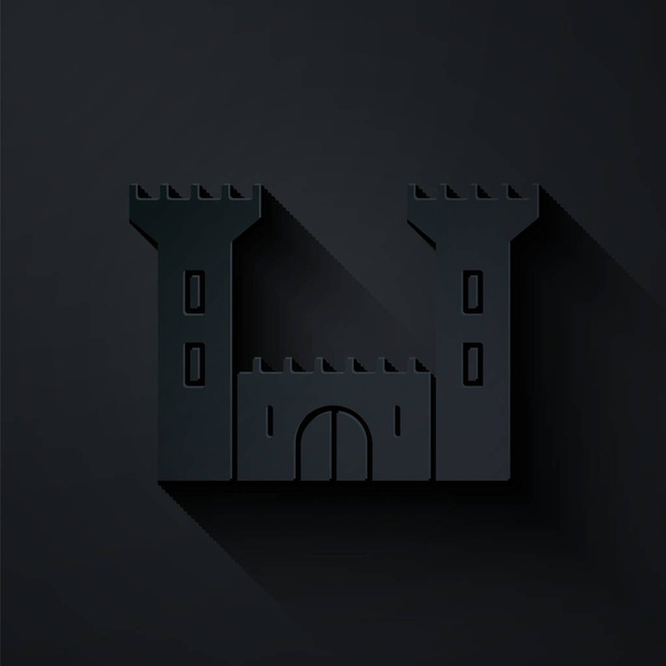 Papírvágás Castle ikon elszigetelt fekete háttérrel. Erődjel. Papírművészeti stílus. Vektorillusztráció - Vektor, kép