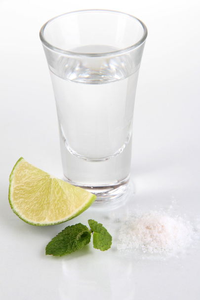 Tequila in glass isolated on white - Valokuva, kuva