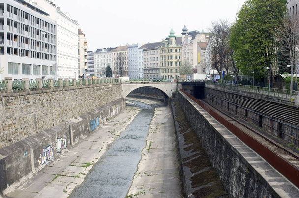 the photography of infrastructure,a water channel and tram tracks in vienna's city centre. - Фото, изображение