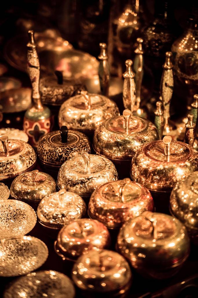 Beautiful shot of gold souvenirs for sale - Foto, imagen