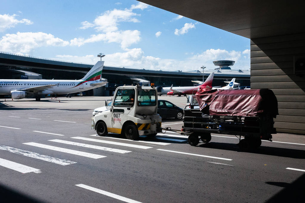 July 2, 2019 Moscow, Russia. Small airplane tractor at Vnukovo airport - Foto, imagen