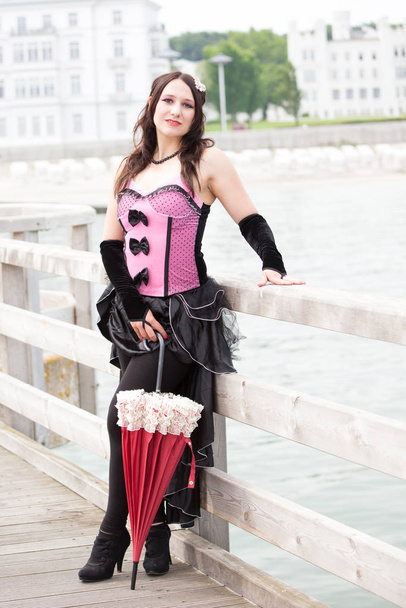 girl posing in cosplay costume   - Foto, afbeelding