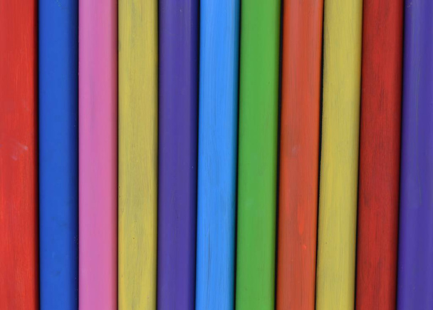 vertical wooden beams in rainbow colors - Zdjęcie, obraz