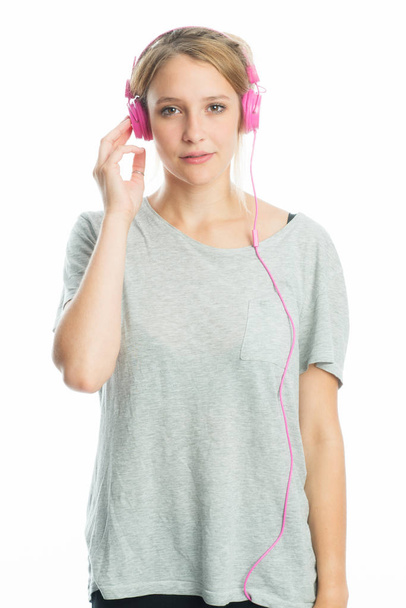 Blonde girl with headphones - Foto, imagen