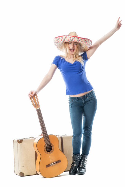 blond girl with suitcase and guitar - Foto, Imagen