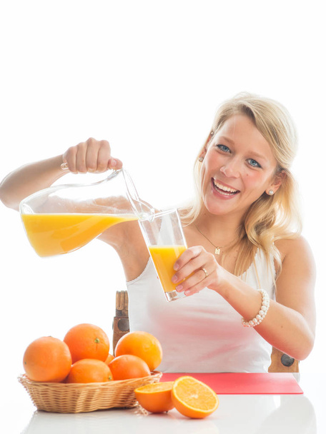 blonde woman with orange juice - 写真・画像