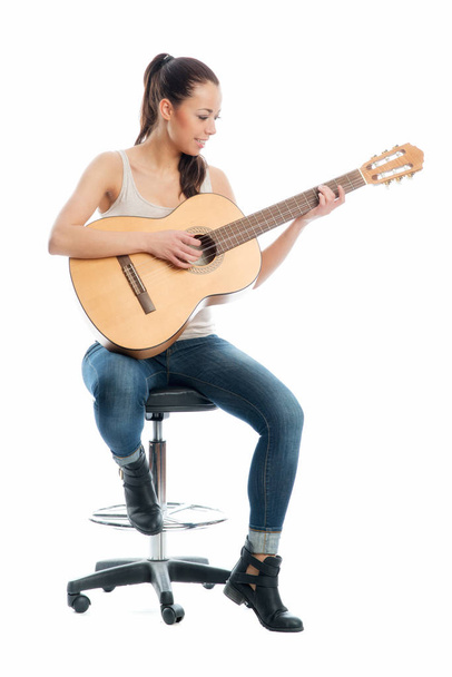 young woman with a guitar - Fotoğraf, Görsel
