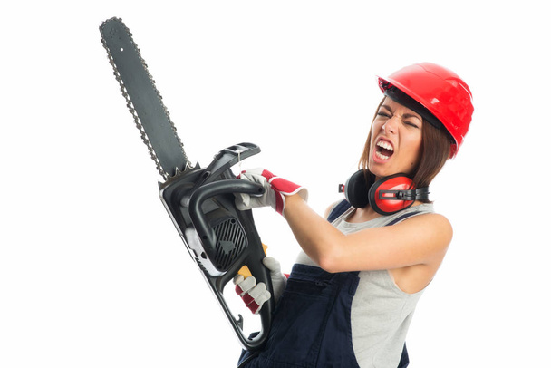 young girl with chain saw - Foto, immagini