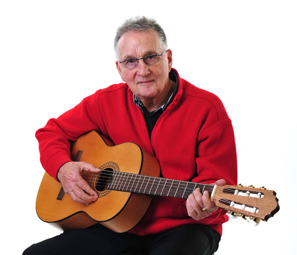 sprightly pensioner playing guitar - Zdjęcie, obraz