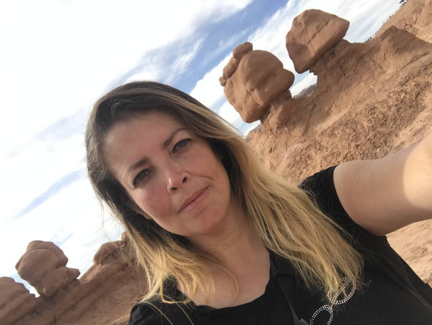 Young Blond Pretty Woman Hiking at  Goblin Valley State park in Utah, USA - Photo, Image