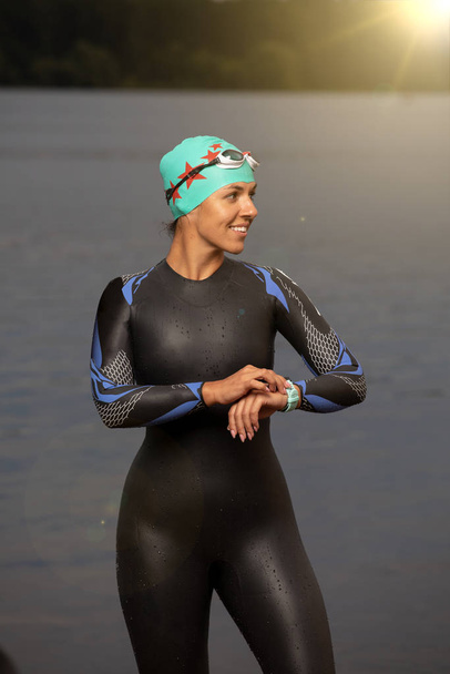 one caucasian woman practicing triathlon swimming  - Photo, Image