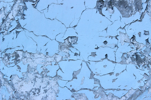 Fondo de textura de pared antigua. Fondo de textura azul abstracto. Antigua pintura agrietada en la pared
. - Foto, Imagen