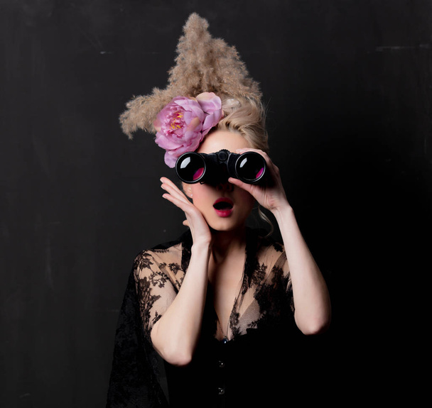 Beautiful blonde countess with binoculars - Фото, зображення