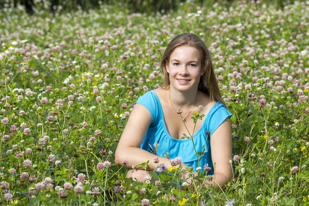 little girl on the meadow in summer day - Fotografie, Obrázek