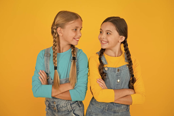 Patriotic upbringing. Independence day. We are ukrainians. Ukrainian kids. Children ukrainian young generation. Celebrate national holiday. Patriotism concept. Girls with blue and yellow clothes - Zdjęcie, obraz