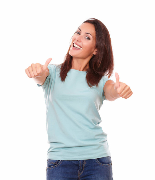 Portrait of pretty adult lady on blue t-shirt with thumb up smiling at you while standing on isolated white background - Φωτογραφία, εικόνα